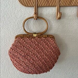 Coral woven purse with bamboo handles